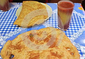 Bolivian Bunuelos Fried Dough with Api Morado Drink