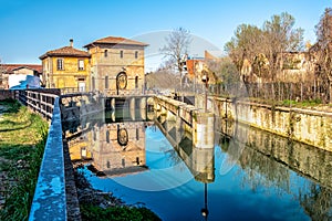 Bologna Battiferro Navile canal river lock - an historic landmark of the italian city photo