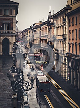 BOLOGNA, ITALY - 15 FEBRUARY, 2016: Via dell Indipendenza street in Bologna during a light rain