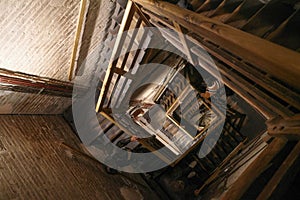 Bologna, Italy - 17 Nov, 2022: Inside the wooden staircase of the Asinelli Tower