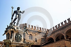 Bologna: Neptune's bronze statue and historic palace photo