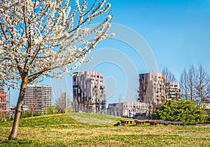 Bologna Quartiere Navile in Italy with Trilogia Navile modern building city park in spring photo