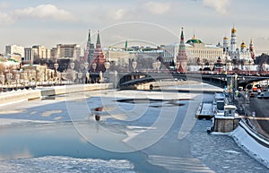 Moscow, Russia - February 22, 2018: Bolshoy Kamenny Bridge is a steel arch bridge spanning Moskva River at the western end of the