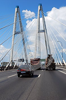 Bolshoy Obukhov cable-stayed permanent bridge on the ` KAD `Ring Road and the movement of cars on it. Saint-Petersburg. Russia