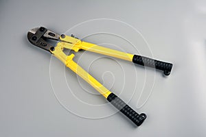 Bolt cutter on concrete surface construction concept.hardware store and manual work tools concept with boltcutter