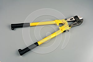 Bolt cutter on concrete surface construction concept.hardware store and manual work tools concept with boltcutter