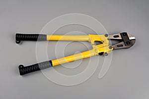 Bolt cutter on concrete surface construction concept.hardware store and manual work tools concept with boltcutter