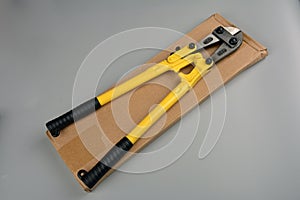 Bolt cutter on concrete surface construction concept.hardware store and manual work tools concept with boltcutter