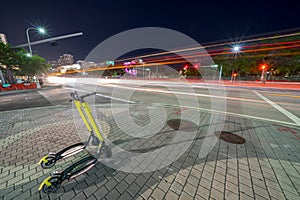 Bolt scooters idle on the streets of Downtown Miami FL