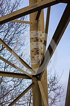 Bolting of a power pole with many cross braces