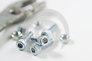 Bolts, nuts and a plyer