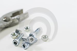 Bolts, nuts and a plyer