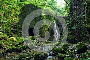 Bolunzulo old mill and waterfall in Kortezubi. Urdaibai Biosphere Reserve. Basque Country. Spain