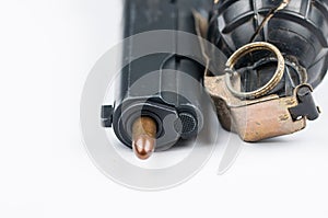 Bomb and bullet and gun isolated on white background.Copy space