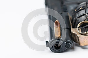 Bomb and bullet and gun isolated on white background.Copy space