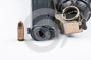 Bomb and bullet and gun isolated on white background.Copy space