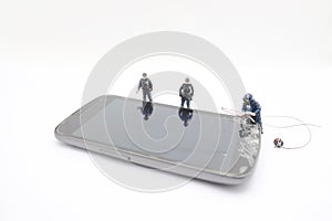 A Bomb squad expert defusing bomb on mobile phone