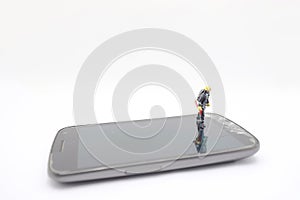 A Bomb squad expert defusing bomb on mobile phone