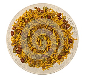 Bombay mix indian snack on round plate