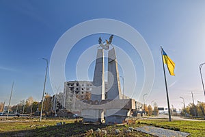 Bombed residential buildings and the inscription the name of the settlement in Ukrainian `Borodyanka`.