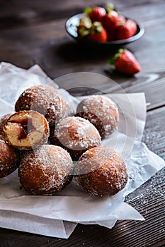 Bomboloni - Italian doughnuts stuffed with strawberry jam