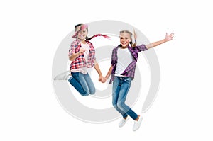 bond of sisterhood and friendship. girls friends having fun and jumping. friendship of two children. happy girls