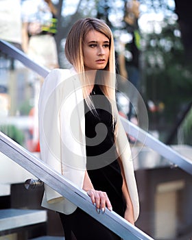 Bonde girl posing on the steps photo