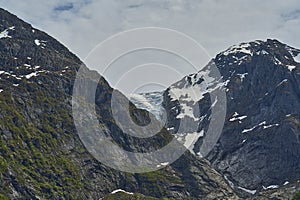 Bondhusbreen Glacier hanging over the Bondhusvatnet Lake