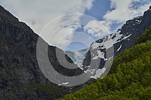 Bondhusbreen Glacier hanging over the Bondhusvatnet Lake