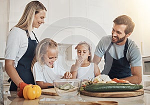 Bonding, cooking and family in the kitchen together for preparing dinner, lunch or supper. Happy, smile and girl