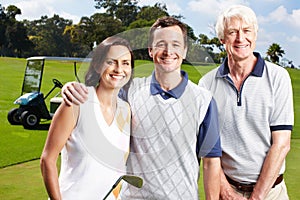 Bonding through a love of golf. Smiling golfing companions on the green with their golf cart in the background.