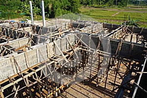 Bonding of reinforcement, making formwork, timbering on construction site.