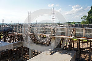Bonding of reinforcement, making formwork, timbering on construction site.