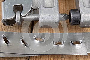 Bonding a sheet metal using a crimper. Small locksmith works in