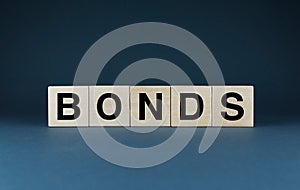 Bonds. Cubes form the word Bonds. Bonds word concept