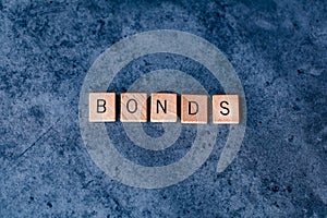 `Bonds` spelled out in wooden letter tiles