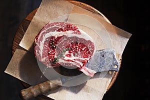 Bone In Rib Eye row Steak and knife