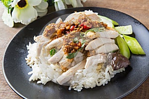 Boned, sliced Hainan-style chicken with marinated rice photo
