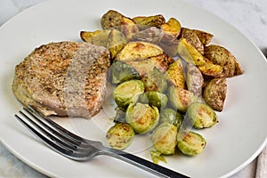boneless pork chop with rosted brussel sprouts