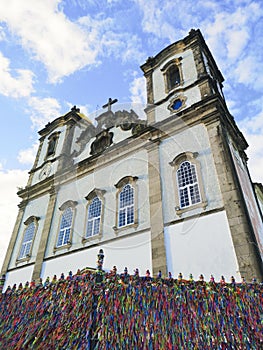 Bonfim Church facade with colored ribbons on the grid