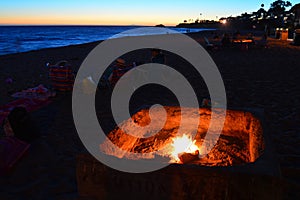 Bonfire on the beach at sunset