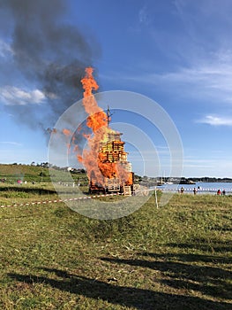 Bonfire, decorated with a wich on the top