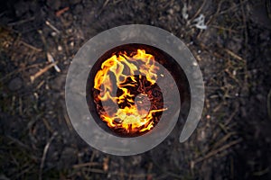 Bonfire in the earth - Dakota fire hole for survival in the wild