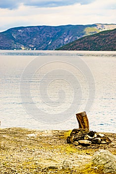 Bonfire and fjord landscape, Norway