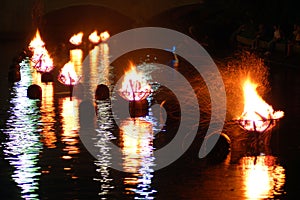 Bonfires burn on the river photo