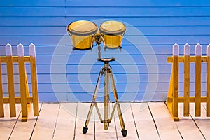 Bongo drums on a blue background