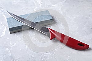 Boning knife and sharpening stone