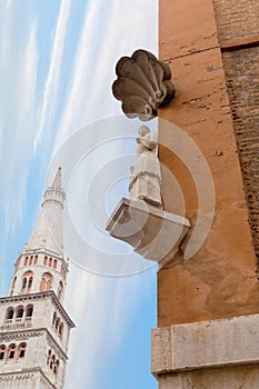 Bonissima is medieval statue on the corner of ModenaTown Hall