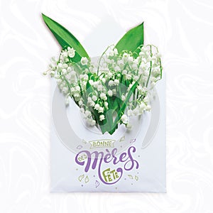 Bonne fete des Meres Mothers day greeting card in french. Creative layout made with Bouquet of lilies of the valley in
