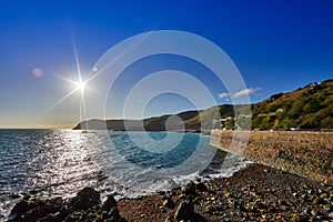 Bonne Nuit Bay Harbour wall and headland photo